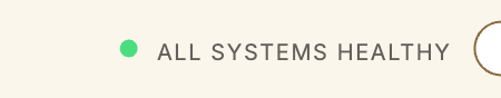 Close-up of the health light reading “All Systems Healthy.”